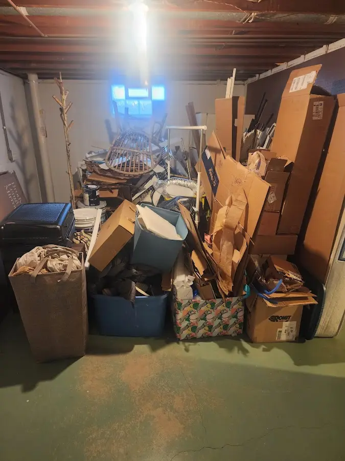 Roll-off dumpster container at job site for Concrete Dumpster Rental in Ault